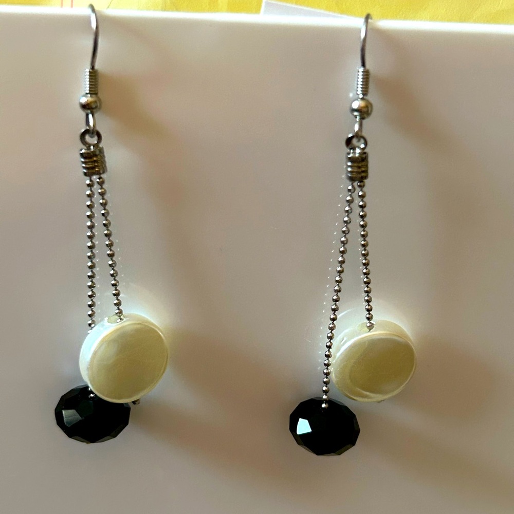 Black and white dangle earrings.